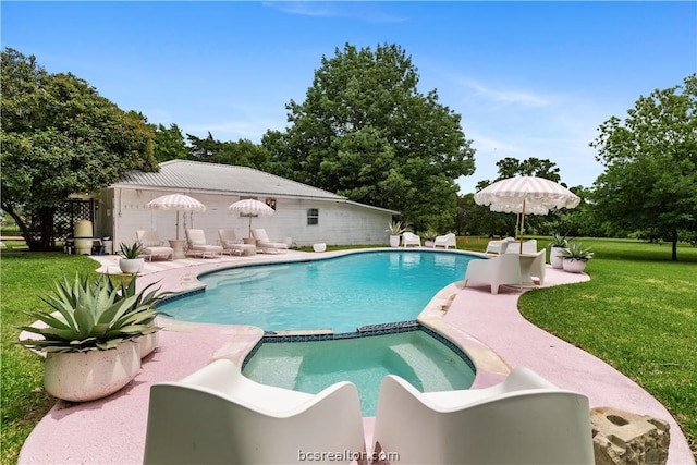 view of pool featuring a yard and a patio