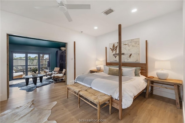 bedroom featuring ceiling fan and light hardwood / wood-style flooring