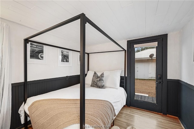 bedroom with hardwood / wood-style floors