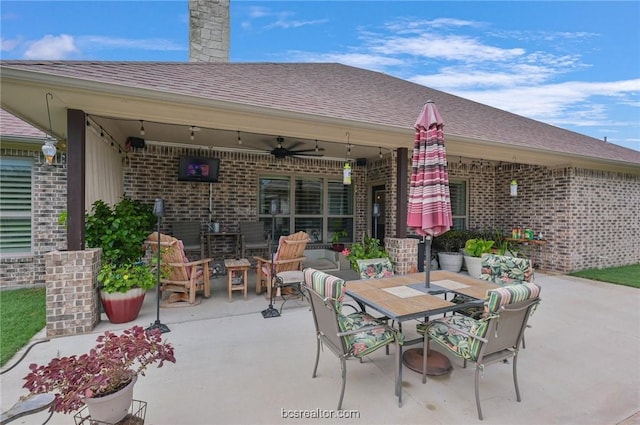 view of patio featuring an outdoor living space and ceiling fan