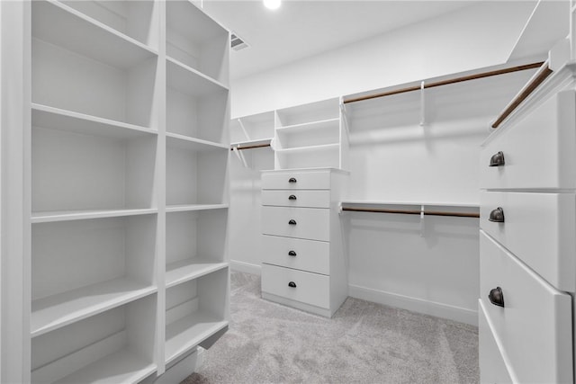 2906 Spector Dr, Bryan, TX 77808 - walk in closet featuring visible vents and light carpet