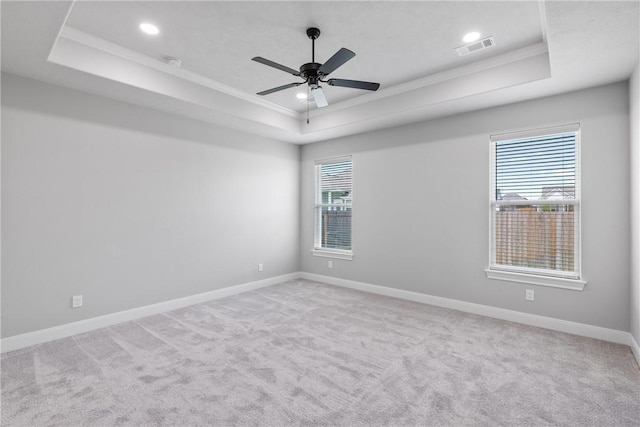 2906 Spector Dr, Bryan, TX 77808 - empty room with ornamental molding, carpet, a raised ceiling, and visible vents
