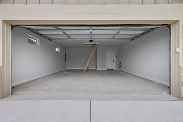 2906 Spector Dr, Bryan, TX 77808 - garage featuring baseboards