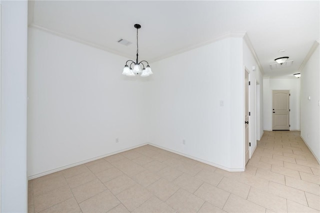 empty room featuring crown molding, baseboards, and visible vents