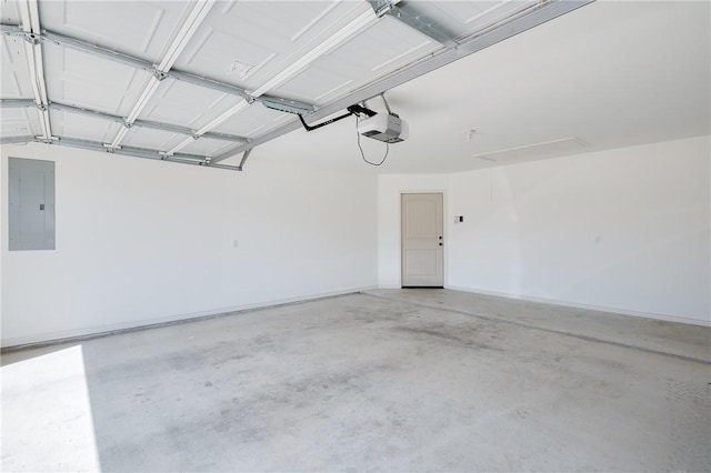 garage with electric panel, a garage door opener, and baseboards