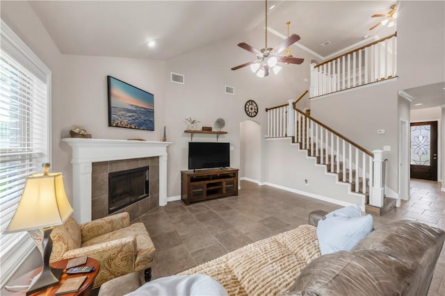 2609 Kimbolton Dr, College Station, TX 77845 - living room with ceiling fan, plenty of natural light, stairway, and high vaulted ceiling