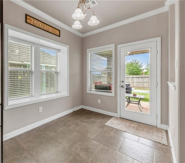 2609 Kimbolton Dr, College Station, TX 77845 - entryway with healthy amount of natural light, crown molding, a chandelier, and baseboards