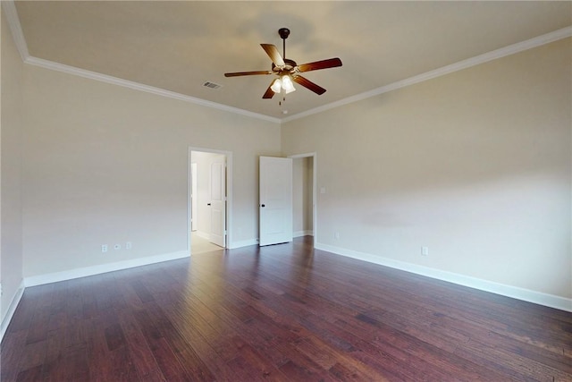 empty room featuring visible vents, baseboards, a ceiling fan, dark wood-type flooring, and crown molding