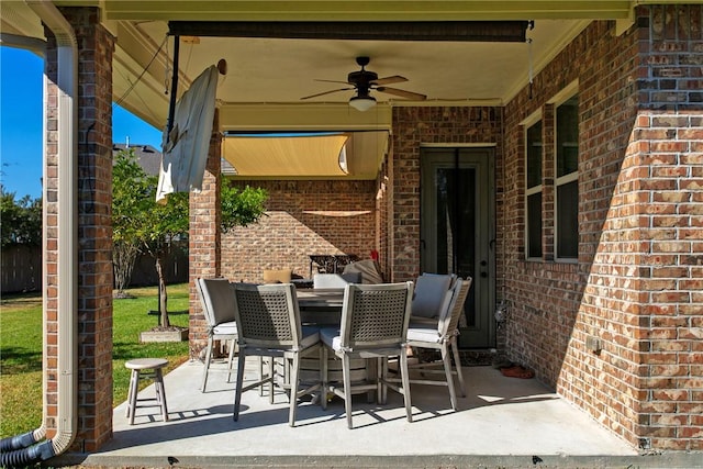 view of patio / terrace featuring ceiling fan and outdoor dining space