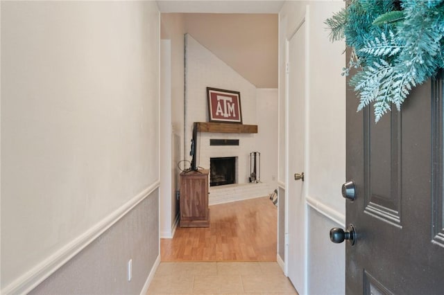 3300 Dallis Dr, College Station, TX 77845 - hallway featuring light tile patterned floors and lofted ceiling