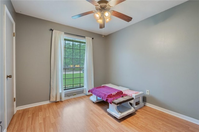 3300 Dallis Dr, College Station, TX 77845 - bedroom with light wood-type flooring and a ceiling fan