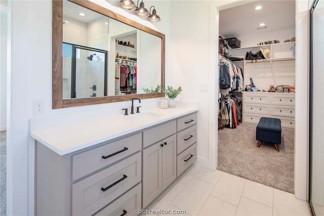 bathroom with vanity and walk in shower