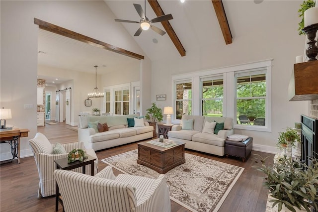 5026 Yellow Tanager Ct, College Station, TX 77845 - living area with high vaulted ceiling, a ceiling fan, beamed ceiling, dark wood-type flooring, and baseboards