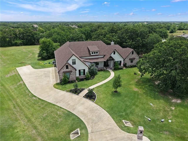 5026 Yellow Tanager Ct, College Station, TX 77845 - view of subject property with a heavily wooded area