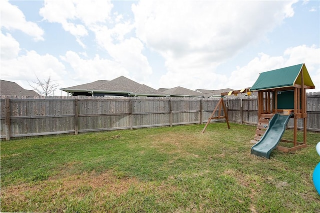 view of yard featuring a playground