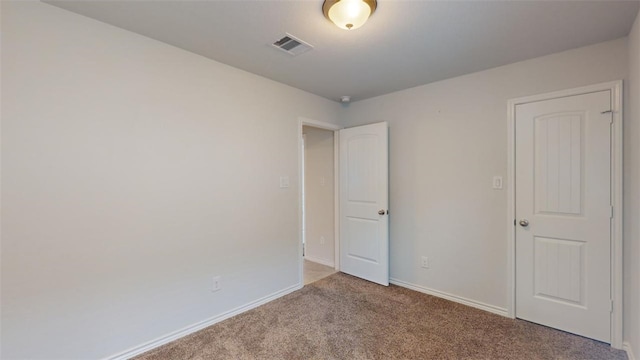 1924 Cartwright St, Bryan, TX 77807 - unfurnished bedroom with carpet flooring and baseboards
