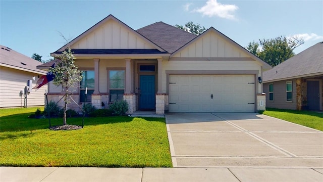 1924 Cartwright St, Bryan, TX 77807 - craftsman inspired home featuring board and batten siding, a garage, driveway, and a front yard