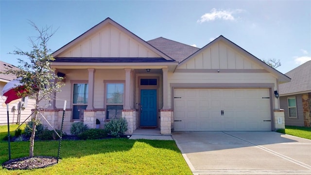 1924 Cartwright St, Bryan, TX 77807 - view of front of property with board and batten siding, a garage, concrete driveway, and a front lawn