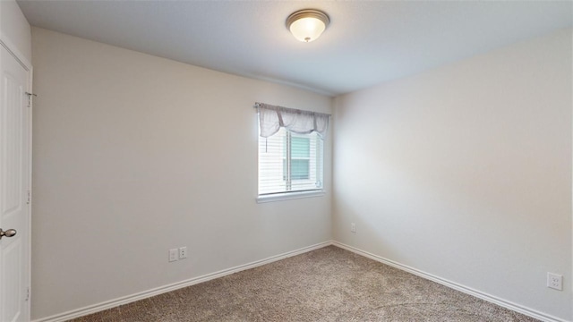 1924 Cartwright St, Bryan, TX 77807 - empty room featuring carpet floors and baseboards
