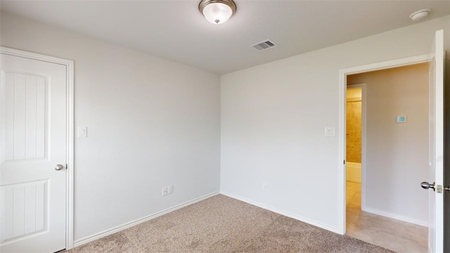 1924 Cartwright St, Bryan, TX 77807 - carpeted empty room featuring a smoke detector and baseboards