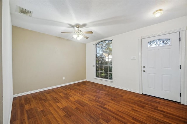 entryway with dark hardwood / wood-style floors and ceiling fan