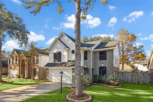 view of front property with a front yard and a garage