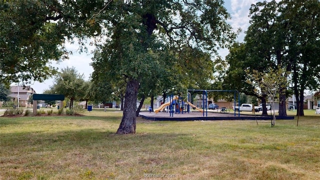 view of play area with a yard