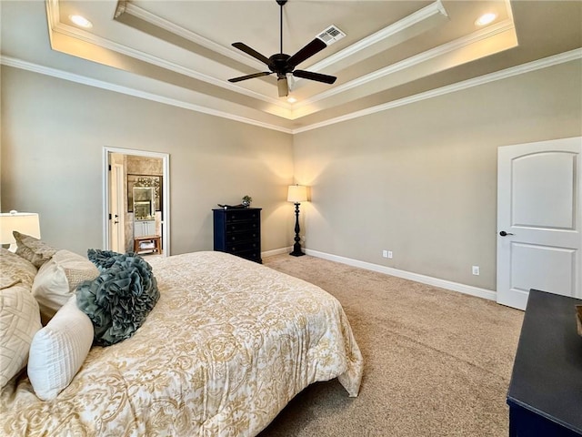 3204 Ashville Path, Bryan, TX 77808 - carpeted bedroom featuring a tray ceiling, crown molding, and a ceiling fan