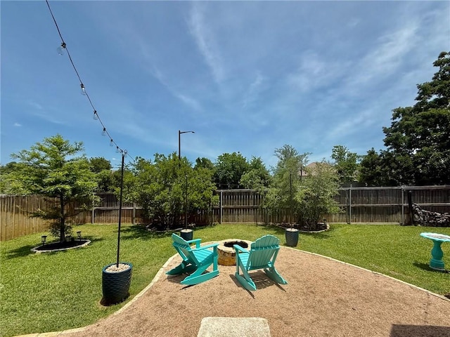 3204 Ashville Path, Bryan, TX 77808 - view of playground with a fenced backyard, a patio area, and an outdoor fire pit