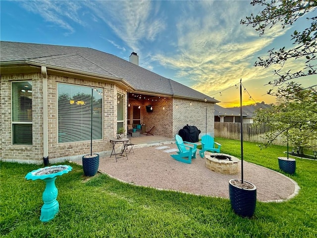 3204 Ashville Path, Bryan, TX 77808 - view of patio with a fire pit