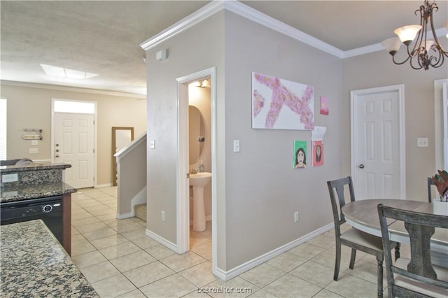 202 Forest Dr, College Station, TX 77840 - dining room featuring light tile patterned floors, a chandelier, crown molding, stairway, and baseboards