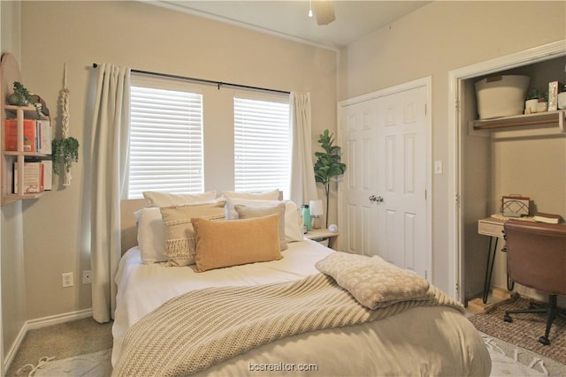 202 Forest Dr, College Station, TX 77840 - bedroom with multiple windows, baseboards, a closet, and carpet