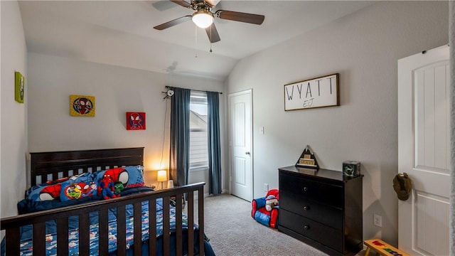 bedroom featuring ceiling fan, carpet flooring, and vaulted ceiling