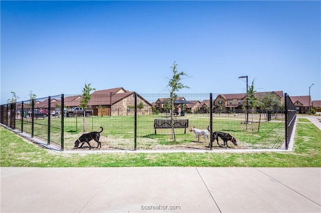 view of community featuring a lawn