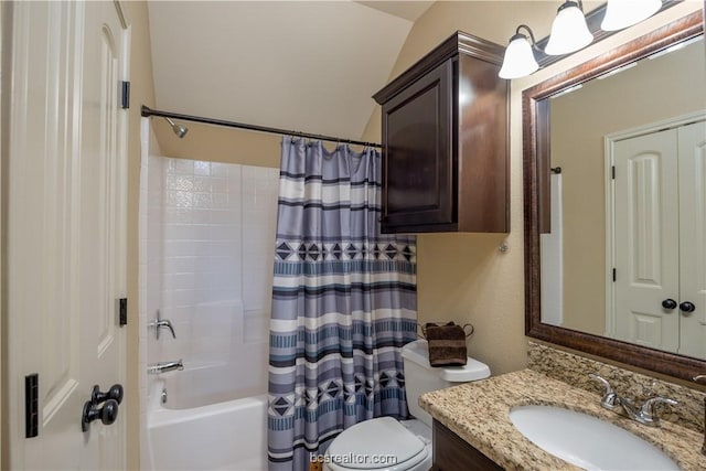 full bathroom featuring shower / bath combination with curtain, toilet, vanity, and vaulted ceiling