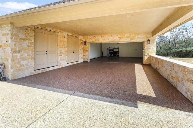 exterior space featuring a garage and driveway