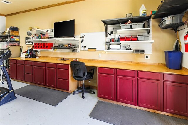 office featuring concrete flooring and visible vents