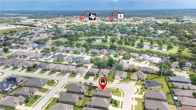 3089 Peterson Cir, Bryan, TX 77802 - aerial overview of property's location featuring a large body of water and nearby suburban area