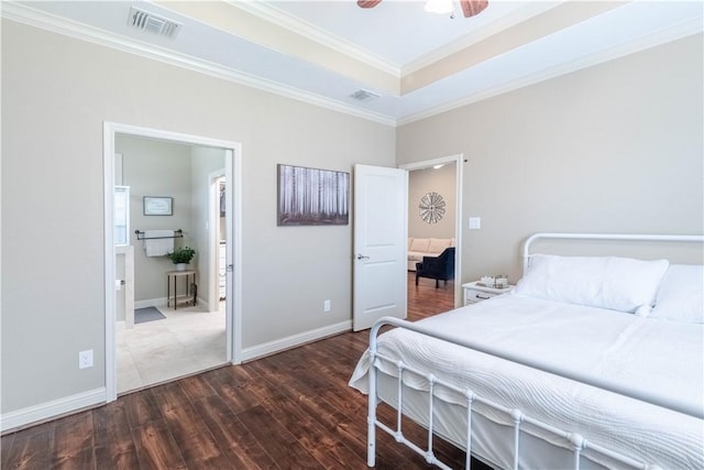 3089 Peterson Cir, Bryan, TX 77802 - bedroom with wood finished floors, crown molding, baseboards, and a ceiling fan