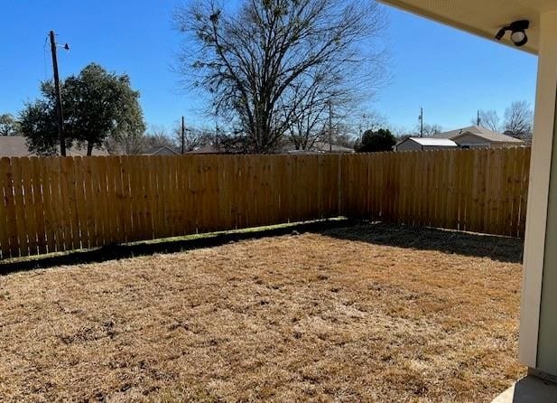 1207 N Houston Ave, Bryan, TX 77803 - view of fenced backyard