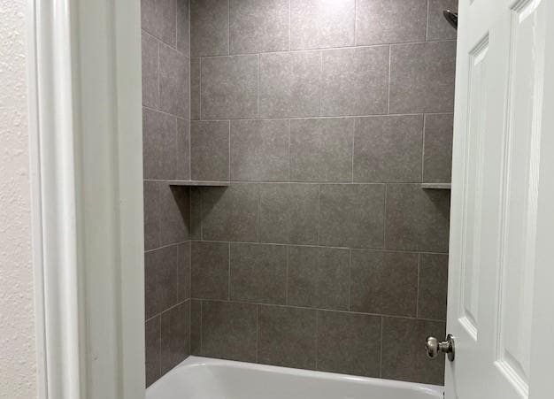 1207 N Houston Ave, Bryan, TX 77803 - bathroom with bathing tub / shower combination