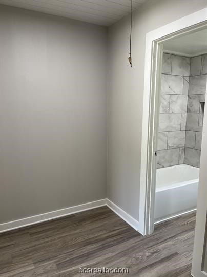 bathroom with wood-type flooring