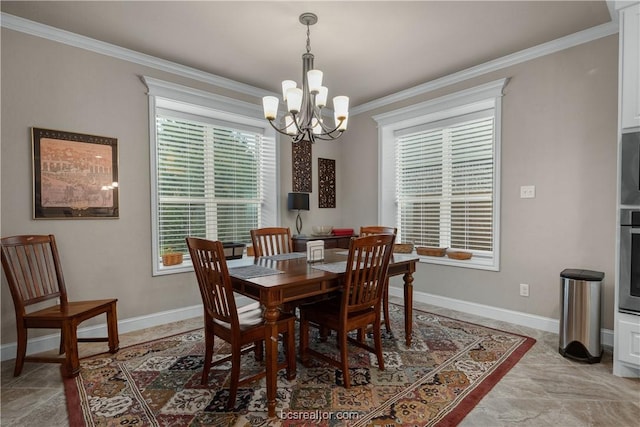 dining area featuring ornamental molding and a notable chandelier