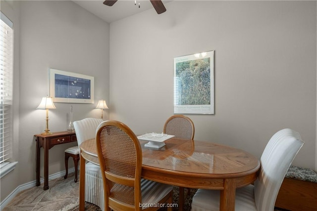 dining room featuring ceiling fan