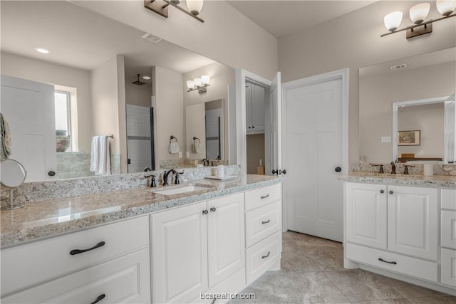 bathroom with vanity and ceiling fan