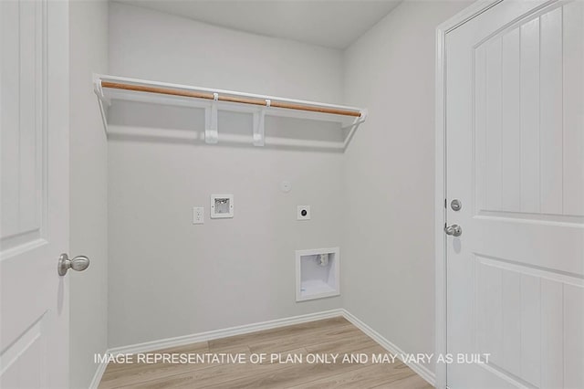 103 Comal Dr, Huntsville, TX 77340 - laundry room with hookup for a washing machine, electric dryer hookup, wood finished floors, and gas dryer hookup