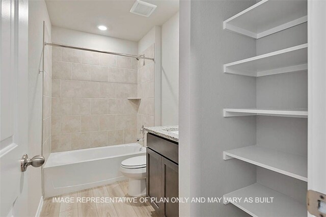 103 Comal Dr, Huntsville, TX 77340 - full bath featuring vanity, shower / tub combination, and recessed lighting