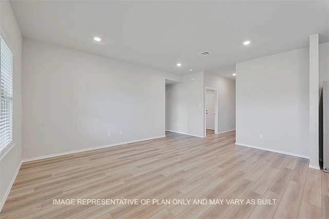 103 Comal Dr, Huntsville, TX 77340 - unfurnished room featuring light wood-style flooring and recessed lighting