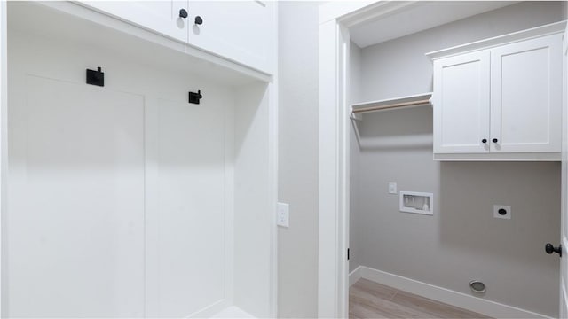 bathroom with hardwood / wood-style floors