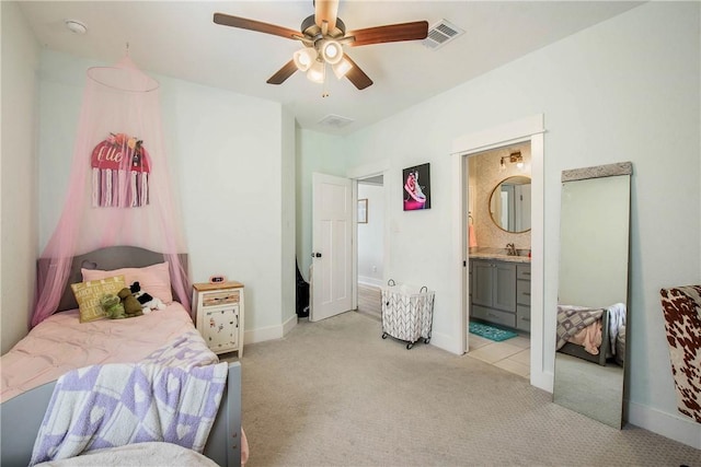 carpeted bedroom featuring ceiling fan, sink, and connected bathroom